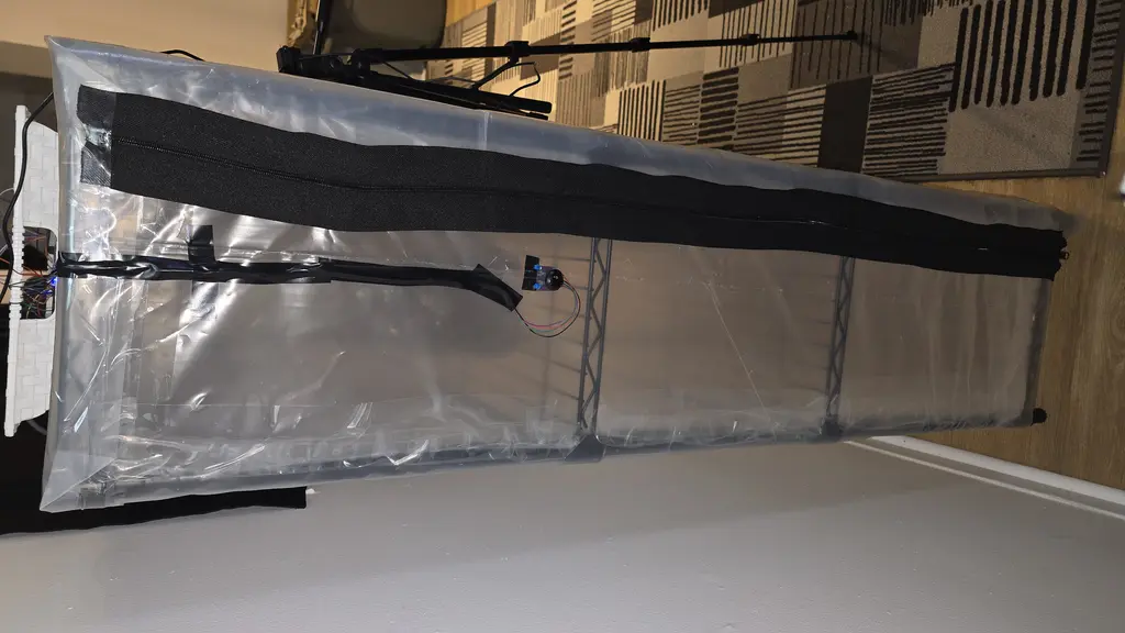 Opposite side view of the grow tent showing zipper access and full unit height